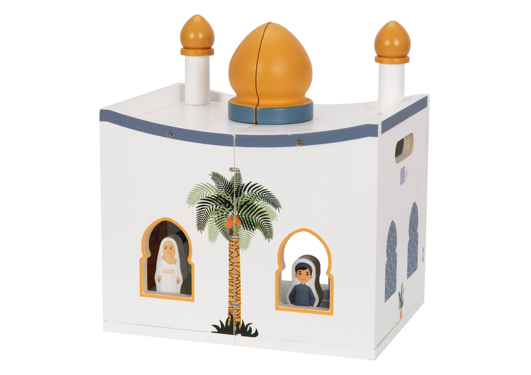 Side view of Lil Crescent wooden Mosque Playhouse with blue geometric windows and two Muslim wooden figures — Islamic toy ages 3 plus